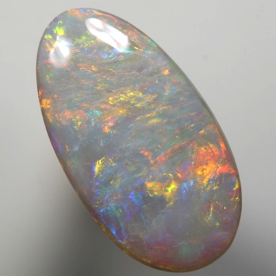 SOLID SEMI BLACK OPAL Citrus fire, orange, lemon and lime over blue